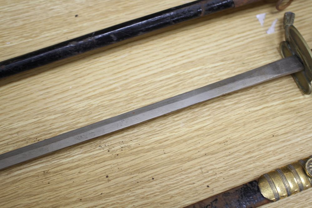A cut steel dress sword by Ede & Ravenscroft of London and two brass hilted dress swords